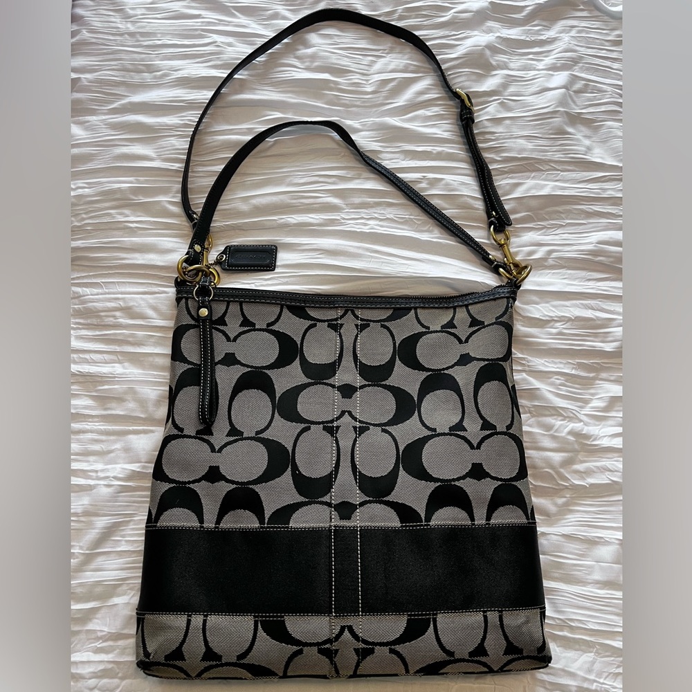 Coach signature handbag. Black/taupe with brass hardware